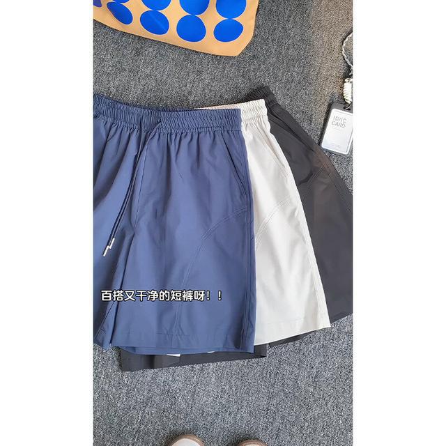 藏青色美式速干短裤男夏季薄款斜切休闲沙滩裤子直筒运动五分中裤商品图