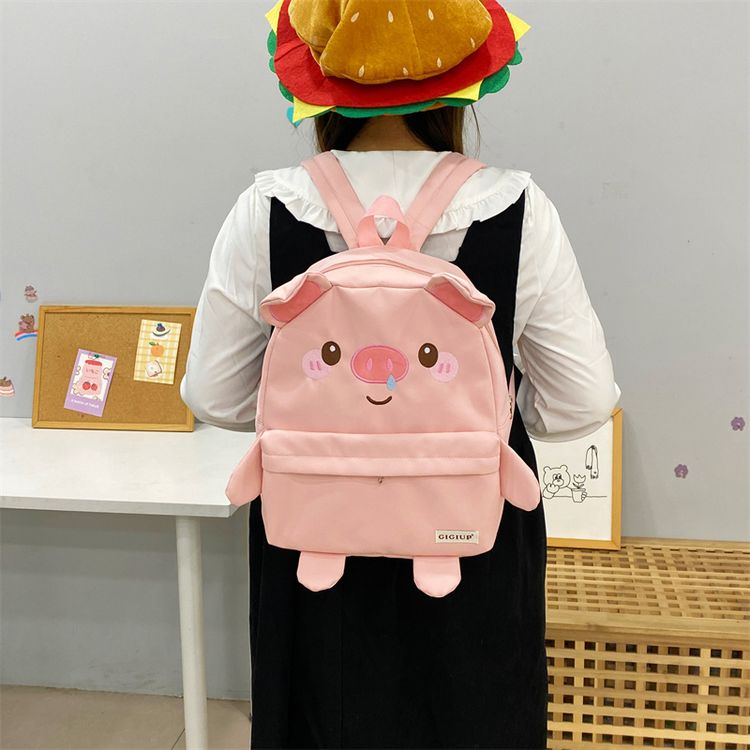 吉吉向上原创正品布款鼻涕小猪百搭大容量卡通学生上课小书包商品图